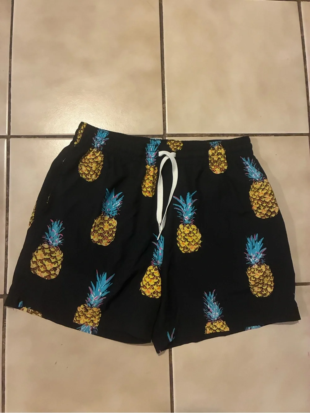 chubbies Black Swim Trunks with Yellow Pineapple and Blue-Teal Tops